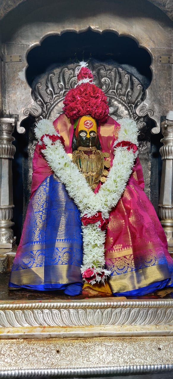 Maa Tulja Bhavani, Tuljapur, adorned in silk and gold for darshan